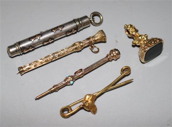 A bloodstone seal, a silver pencil, a 9ct toothpick and a dogs head brooch